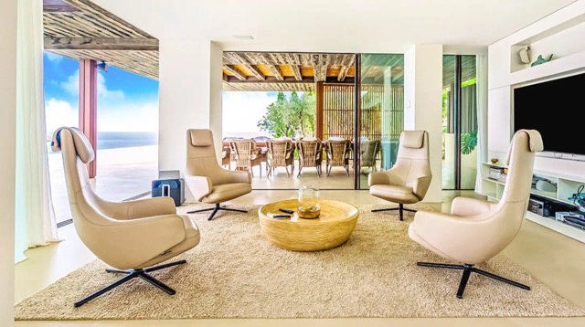 Interior of a luxury private retreat in Ibiza featuring organic architecture and panoramic Mediterranean views.