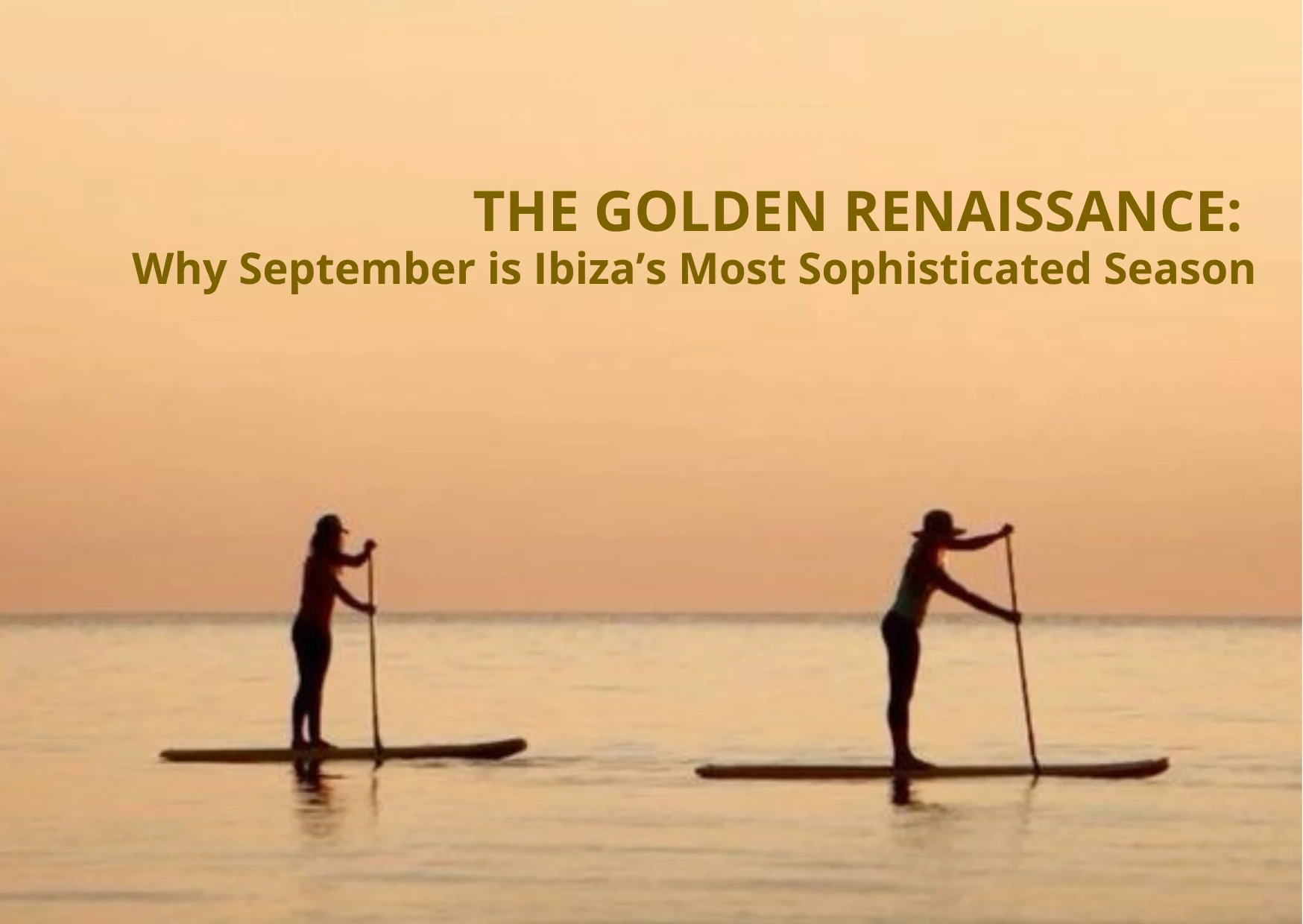 Two women paddle boarding during a golden sunset in the calm Mediterranean waters of Ibiza