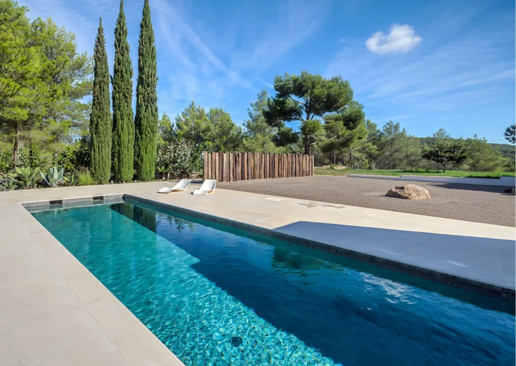 Private pool and lush Mediterranean grounds at a traditional luxury finca in San Mateo, available with Houses in Ibiza