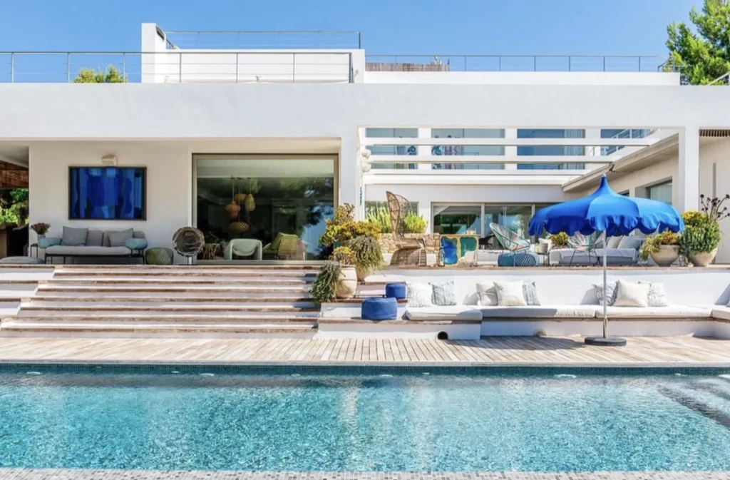 Contemporary outdoor pool with padel court in San Jose, Ibiza villa rental in San Jose.