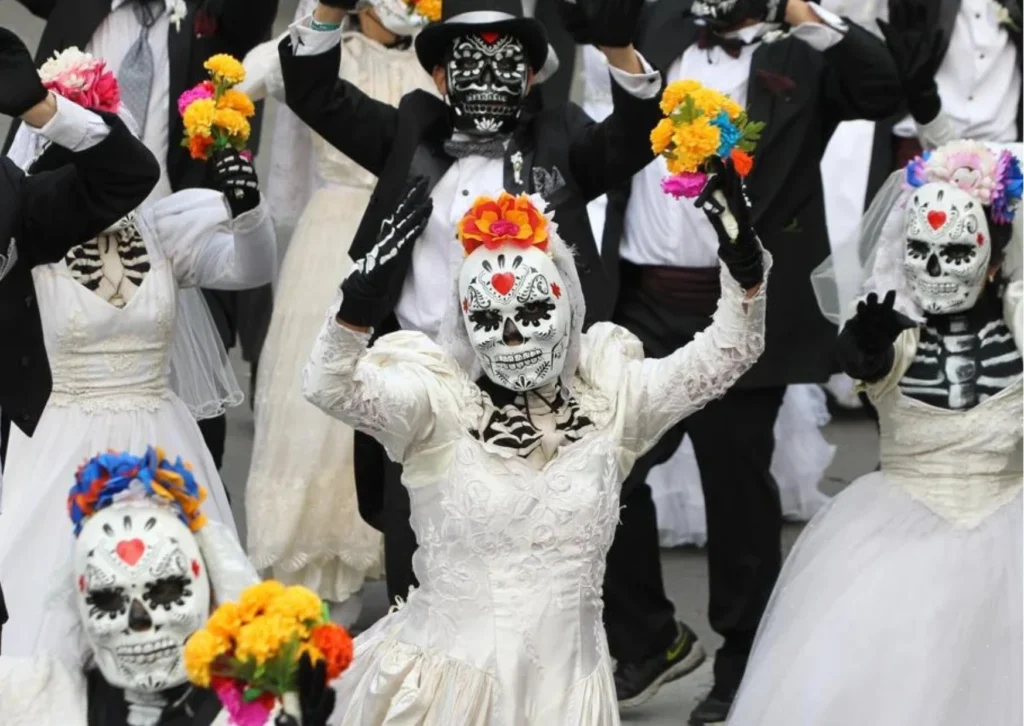 Atmospheric costume parade and street theater performance during the Monster Walk at Vara de Rey in Ibiza Town.
